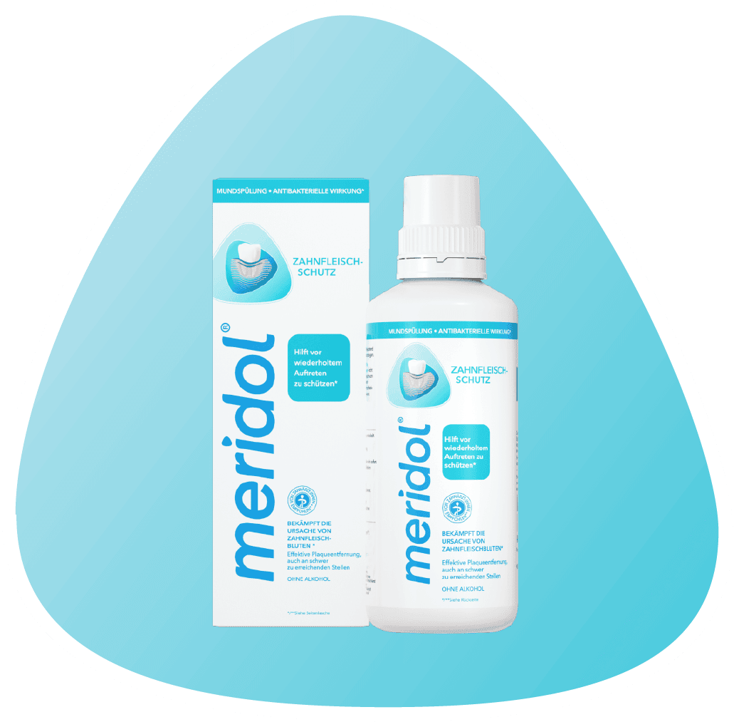 Balenie ústnej vody "meridol " s ilustráciou zuba a ďasien.